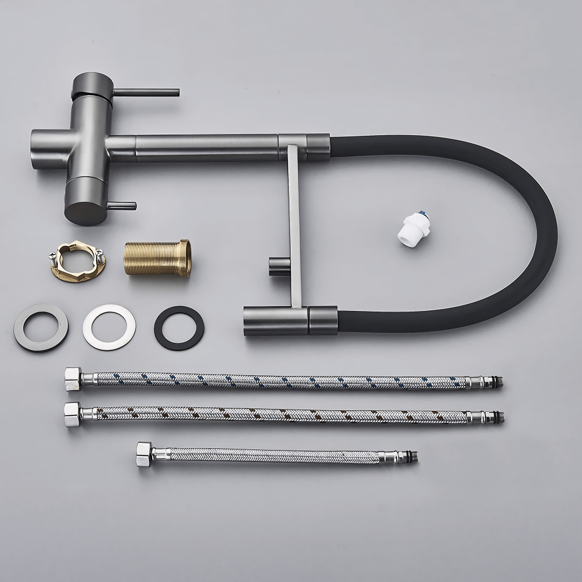 Kitchen faucet assembly with parts on a gray background